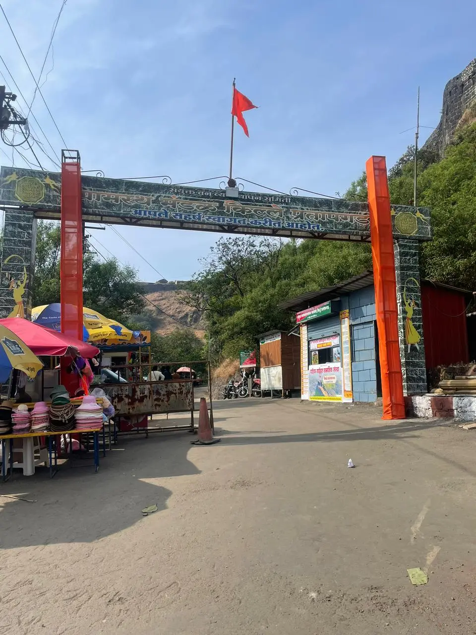 Entrance gate of Jejuri Temple near Pune with visitors and Kadam Tours and Travels service